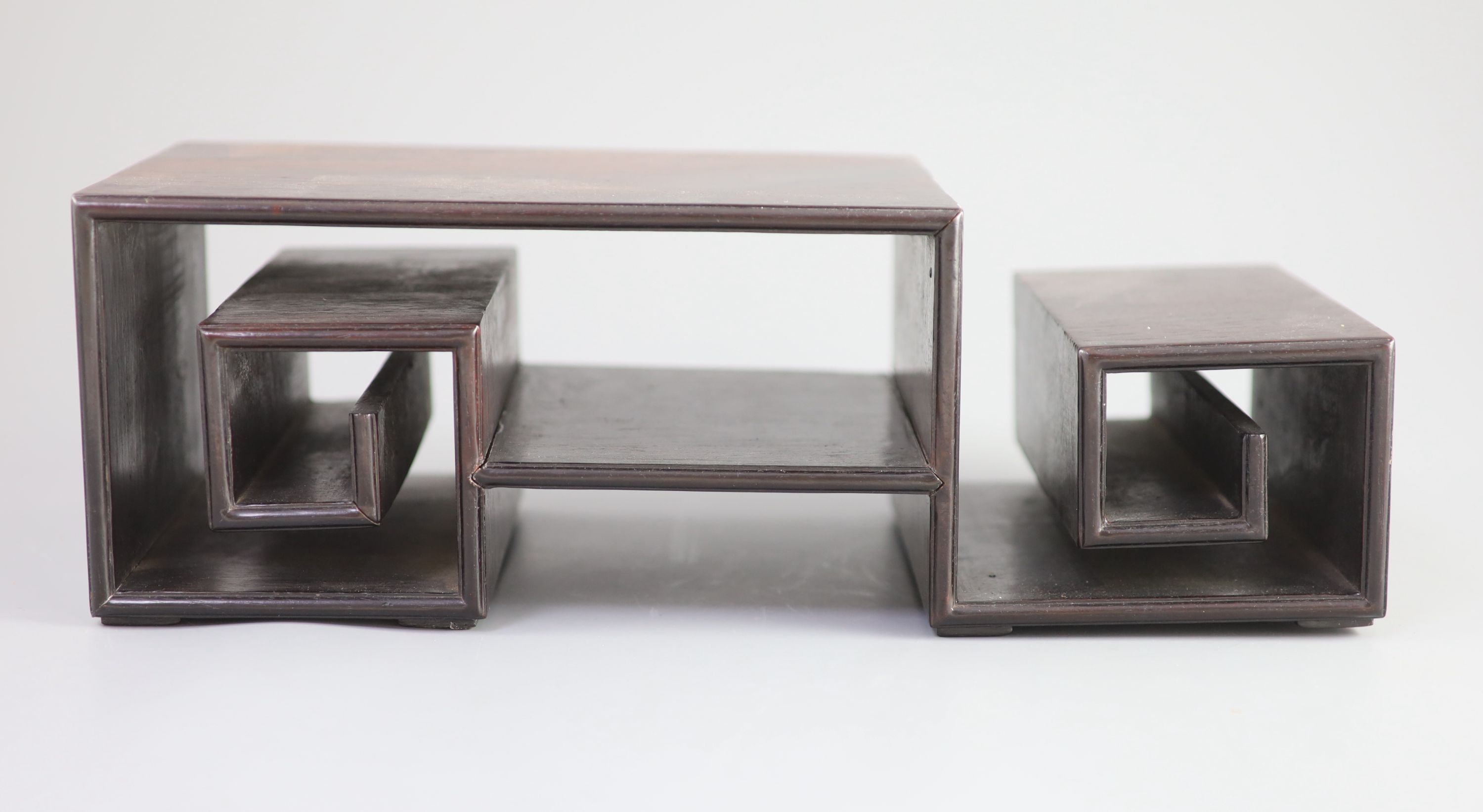 A Chinese hongmu scholar’s stand, 19 century, 34 cm wide